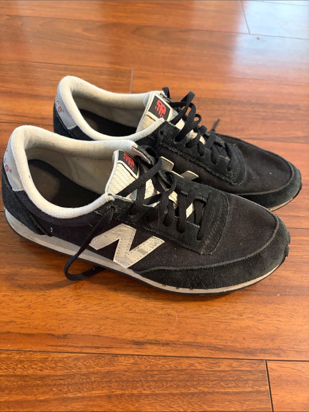 New Balance 410 Women’s Black Suede Low-Top Sneakers with White Logo